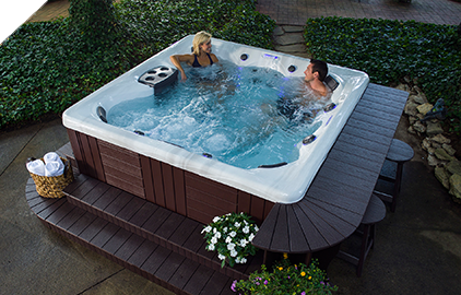 Enjoy your hot tub on a patio to entertain your  guests